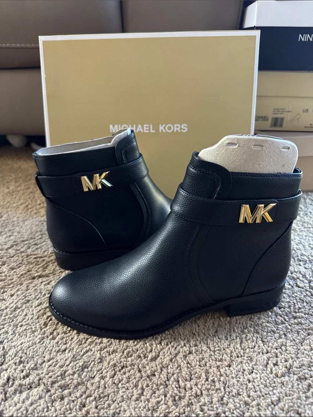 Women’s Michael Kors Black faux Leather MK Logo Ankle Booties with Gold accents